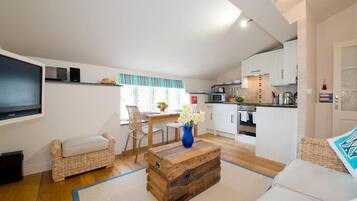Cottage, 1 Bedroom | Living room | Flat-screen TV, DVD player