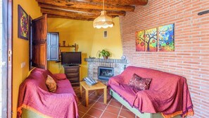 TV, fireplace - El Secano de Paco Órgiva by Ruralidays (Granada)