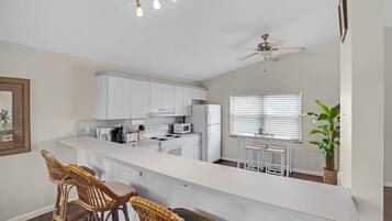 Fridge, microwave, stovetop, cookware/dishes/utensils