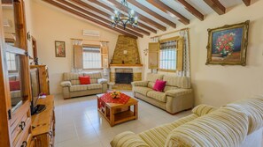 TV, fireplace - Cortijo Metomela Torrox by Ruralidays (Málaga)