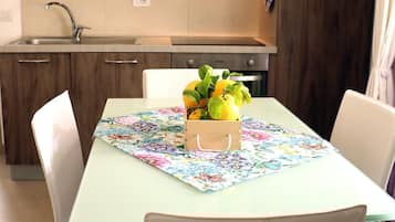 Apartment, Balcony | Private kitchen | Fridge, stovetop