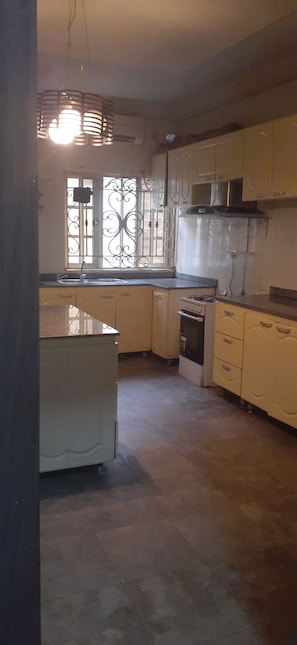 Fridge, microwave, stovetop, cookware/dishes/utensils