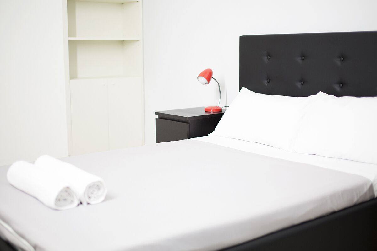 Premium bedding, down comforters, desk, laptop workspace