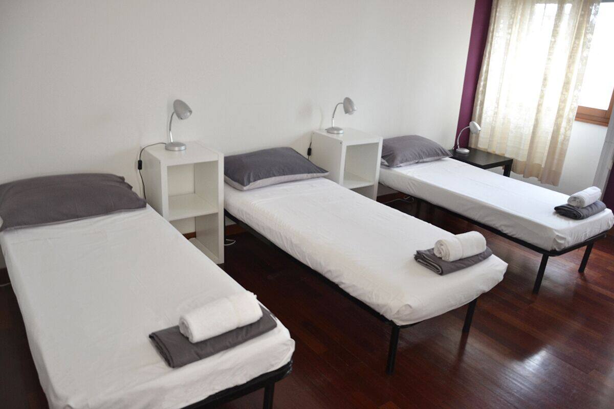 Premium bedding, down comforters, desk, laptop workspace