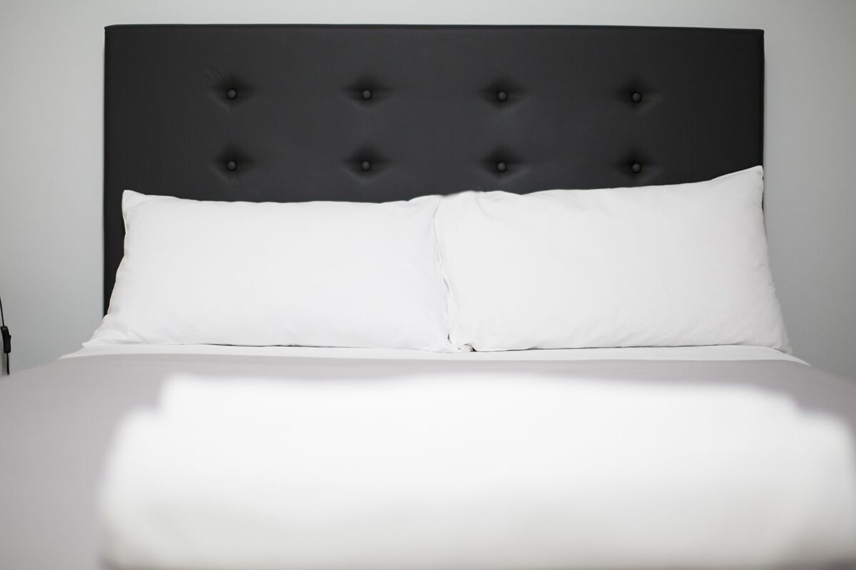 Premium bedding, down duvets, individually decorated