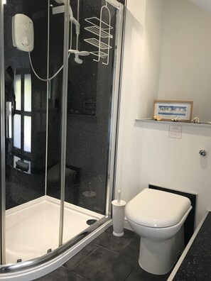 Shower, free toiletries, hair dryer, towels