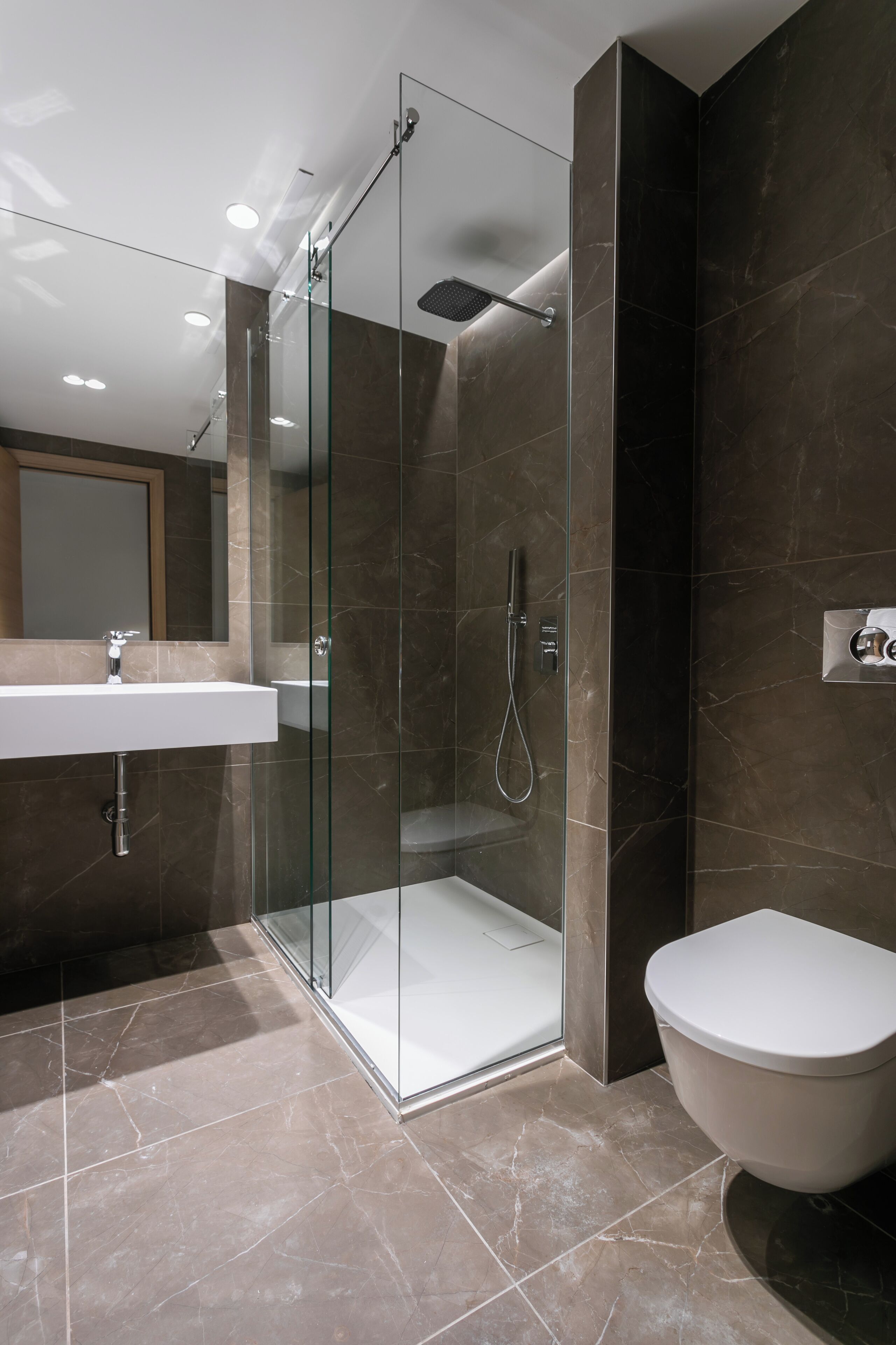 shower, rainfall showerhead, designer toiletries, hair dryer