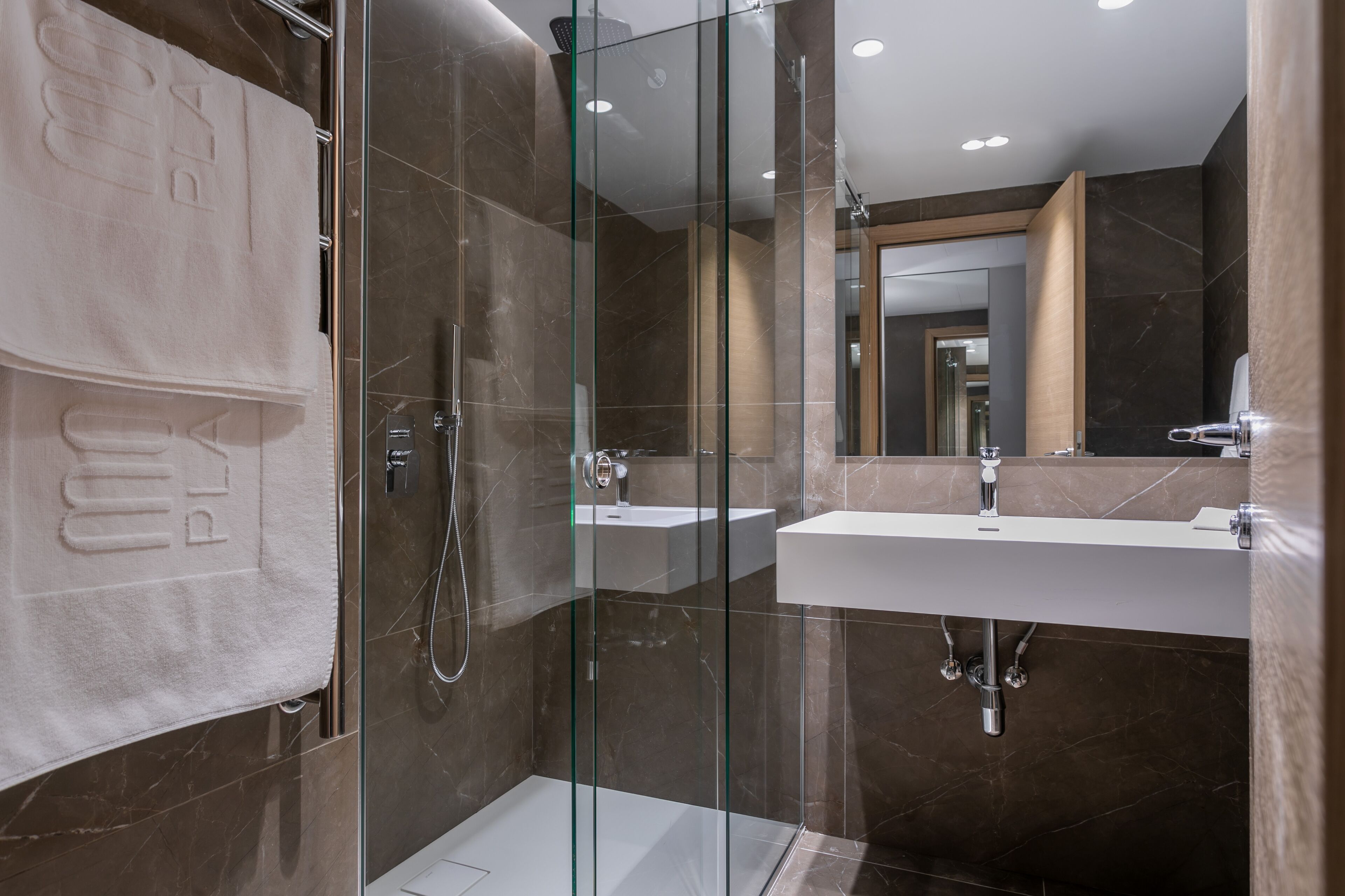 standard double room | bathroom | shower, rainfall showerhead, designer toiletries, hair dryer