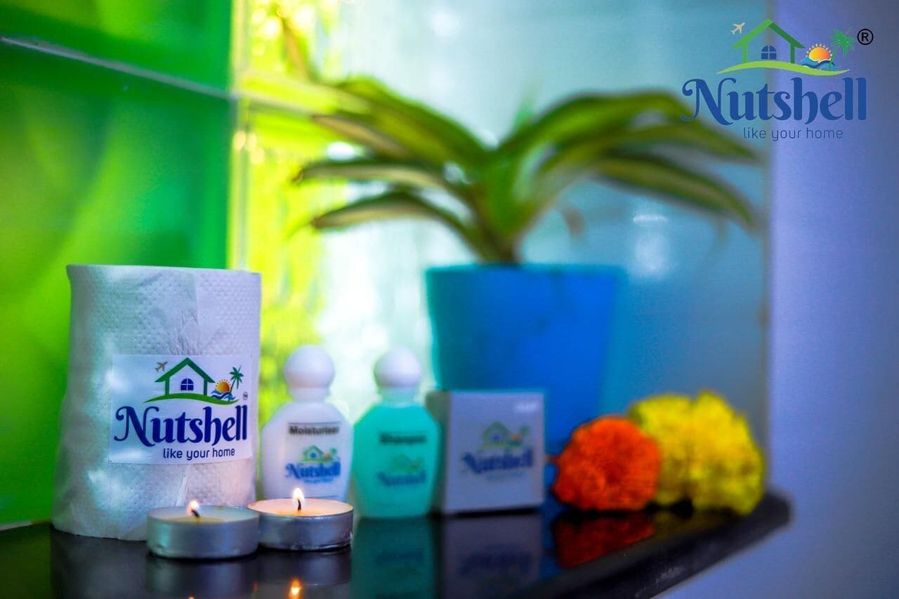 shower, hydromassage showerhead, designer toiletries, slippers