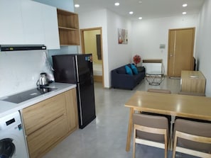 Departamento | Cocina privada | Refrigerador, parrilla de estufa y cafetera de espresso