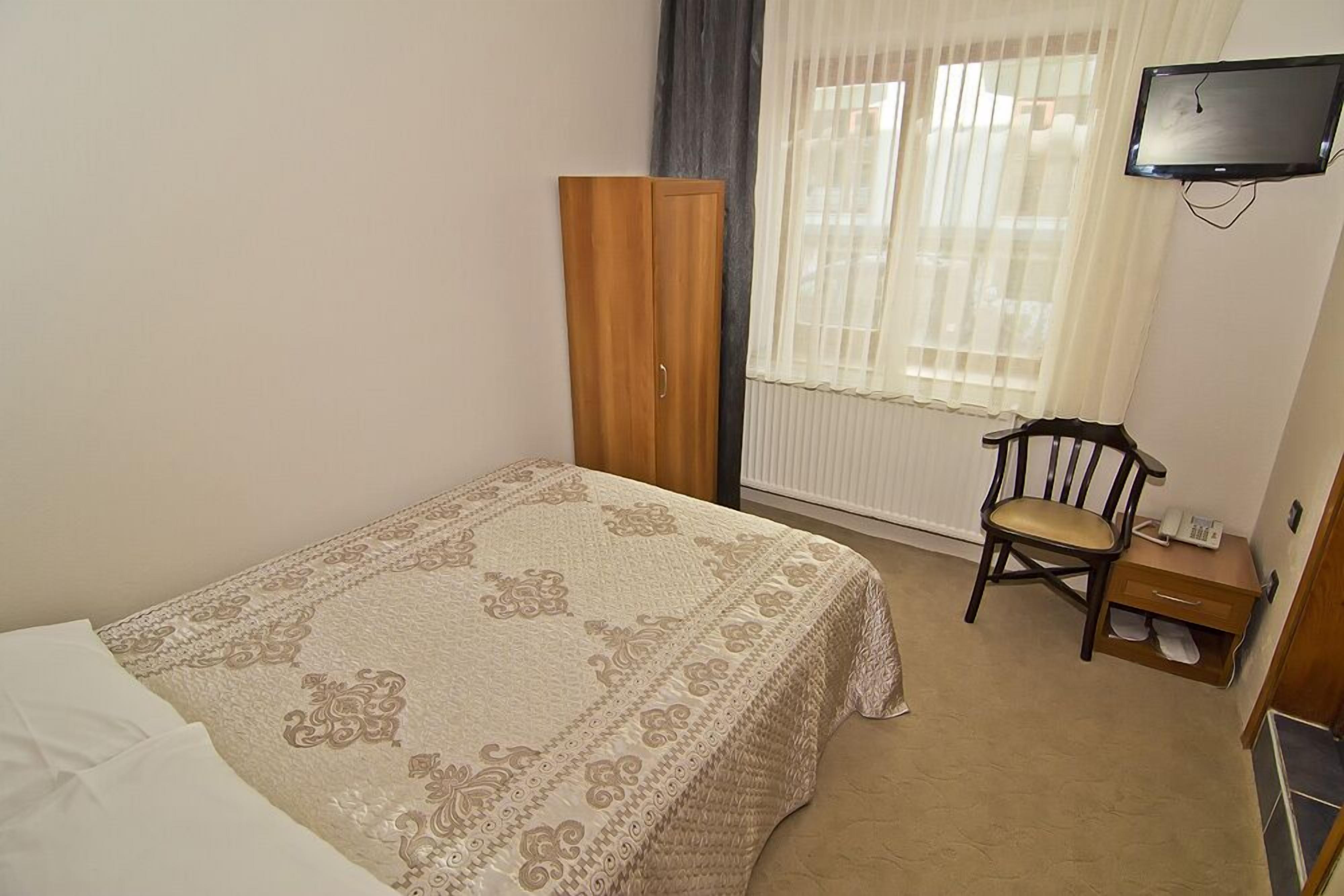 Standard-Einzelzimmer | Kostenlose Babybetten, kostenloses WLAN, Bettwäsche