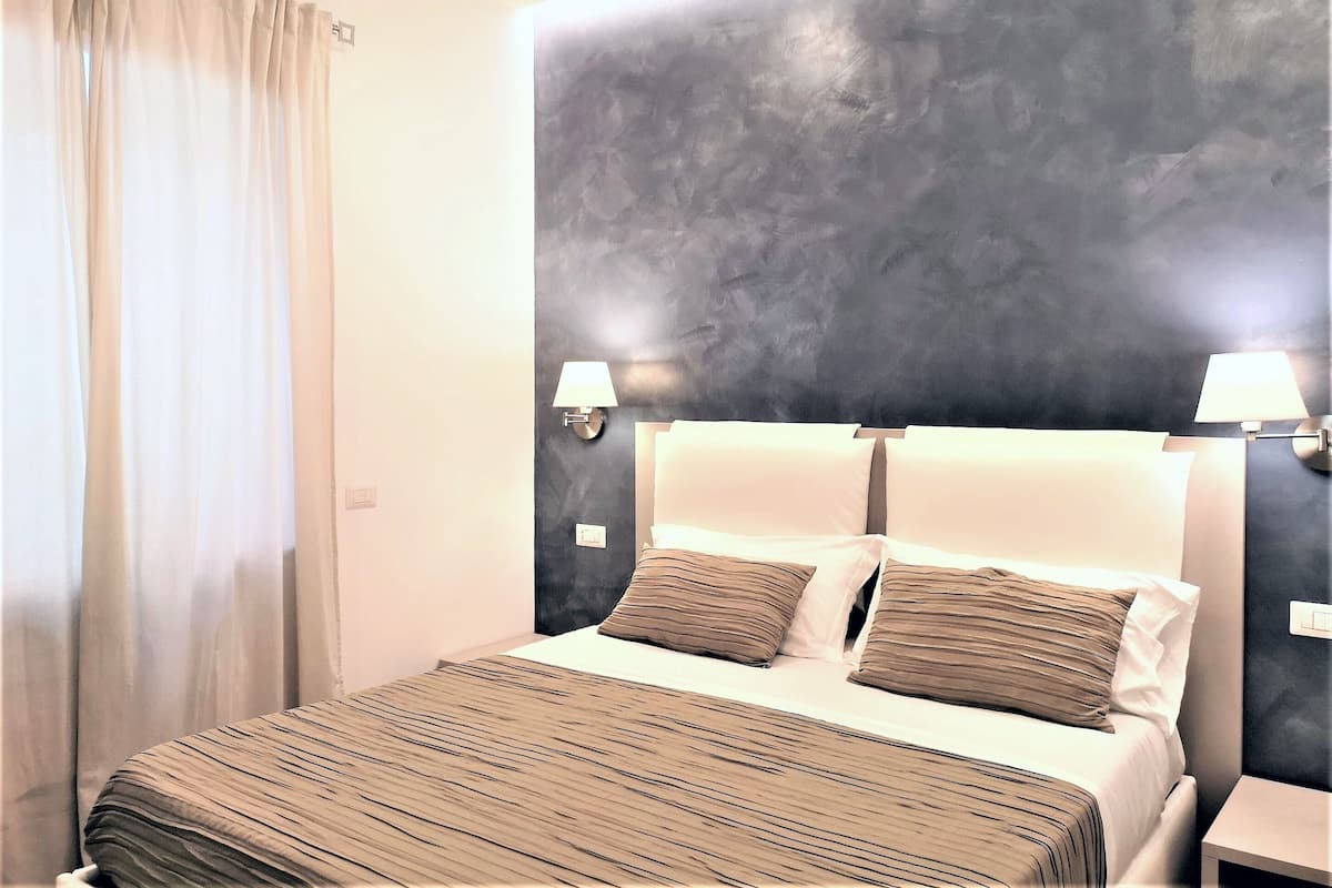 Basic Room | Egyptian cotton sheets, premium bedding, down duvets, memory-foam beds