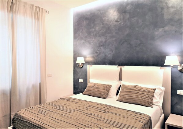 基础客房 | 埃及棉床单、高档床上用品、羽绒被、记忆海绵床垫