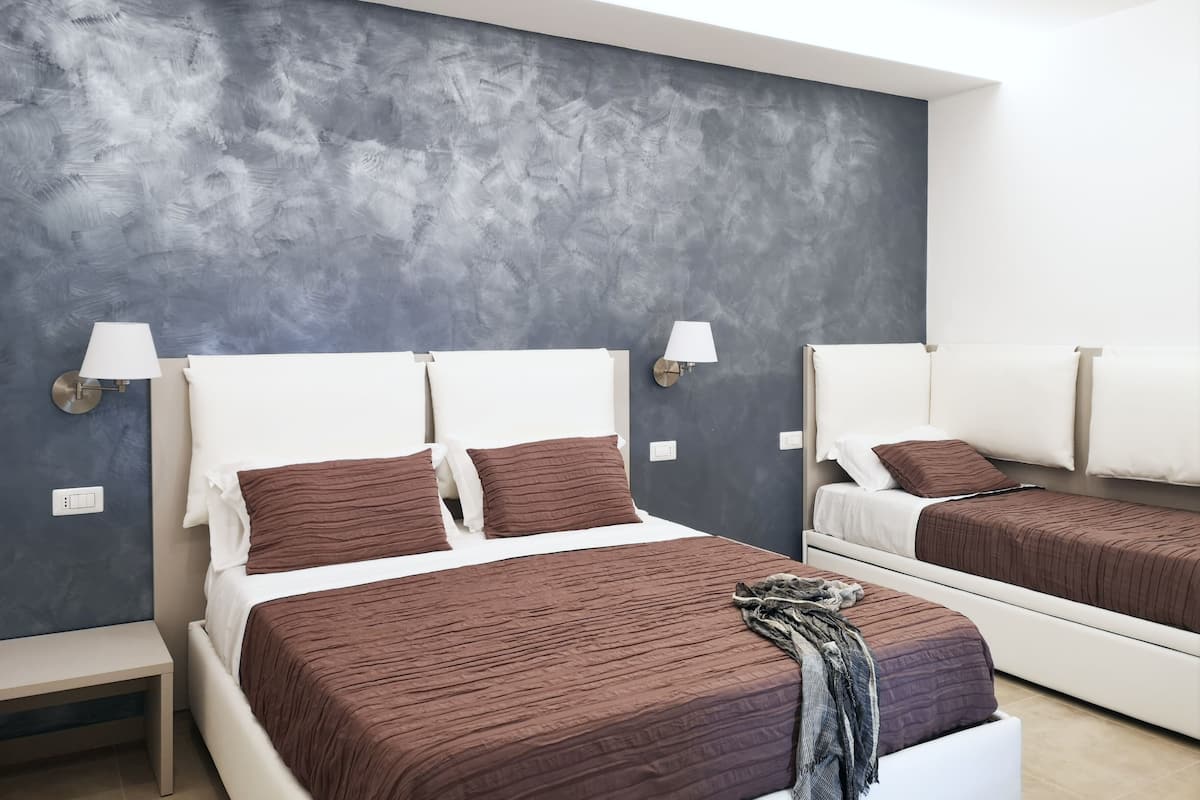 Family Room | Egyptian cotton sheets, premium bedding, down duvets, memory-foam beds