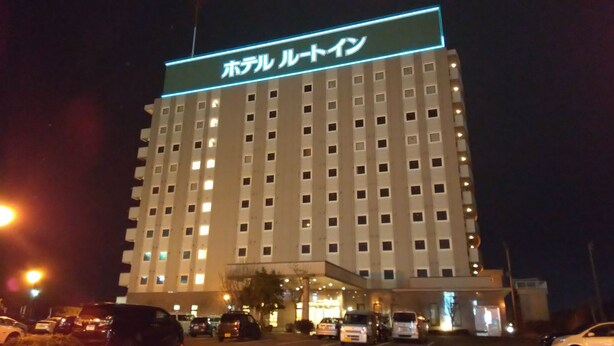 A multi-story hotel with a prominent sign at the top. - Hotel Route Inn Aomori Chuo Inter (Aomori)