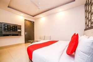 Habitación Deluxe doble | Colchones Select Comfort, minibar, caja fuerte y cortinas opacas