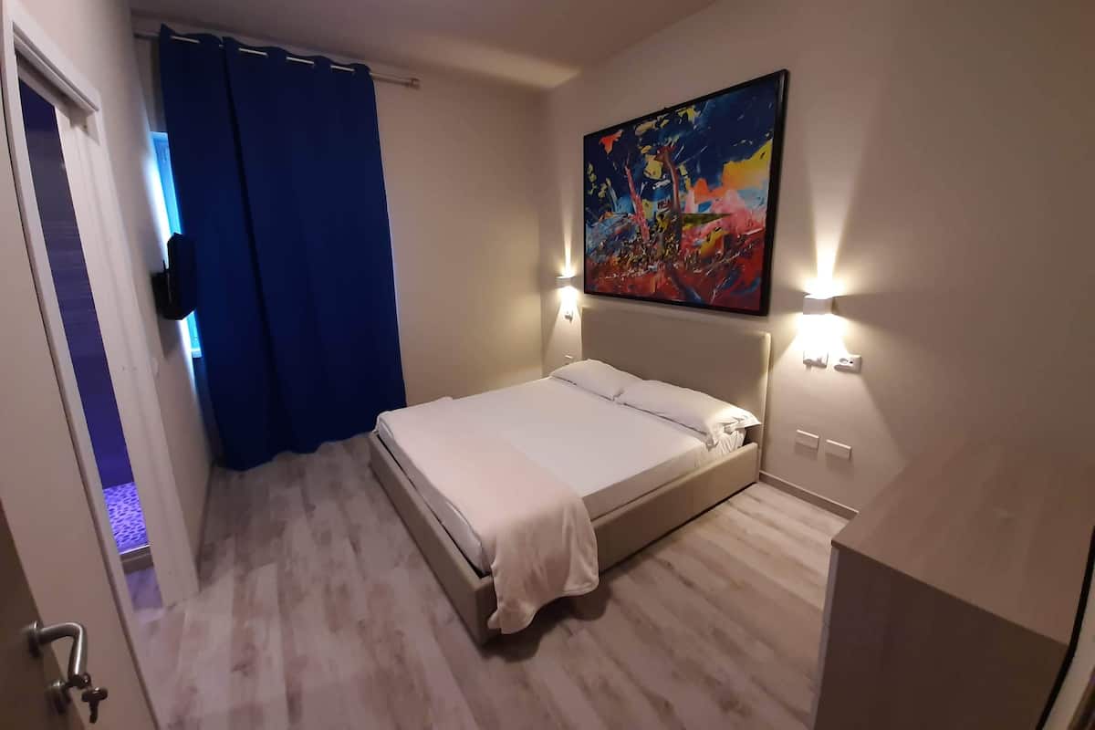 Tweepersoonskamer (Turchese) | Een kluis op de kamer, individueel gedecoreerd, een bureau, gratis wifi