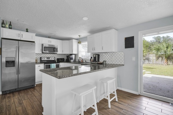 Frigorifero, microonde, forno, piano cottura