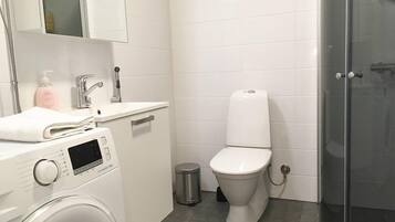 Apartment, 1 Bedroom | Bathroom | Shower, free toiletries, hair dryer, towels