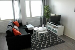 Apartment, 1 Bedroom | Living room | Smart TV