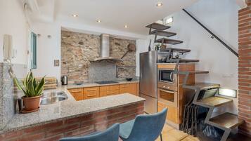 Fridge, microwave, oven, cookware/dishes/utensils