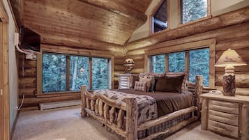 Pine Forest Lodge, with Private Hot Tub | Living room | Flat-screen TV