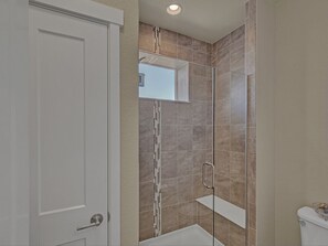 Bathtub, hair dryer, towels, soap