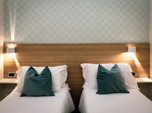 Chambre Deluxe Double ou avec lits jumeaux | Literie de qualité supérieure, décoration personnalisée