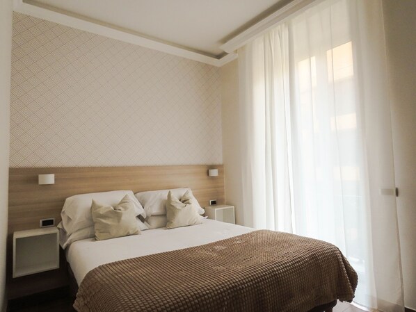 Chambre Deluxe Double ou avec lits jumeaux | Literie de qualité supérieure, décoration personnalisée