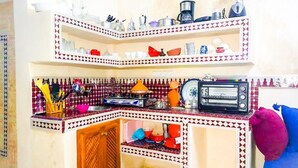 Apartamento, 2 quartos | Cozinha privada | Máquina de café expresso, geladeira, fogão, cooktop