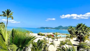 On the beach, sun loungers, beach towels