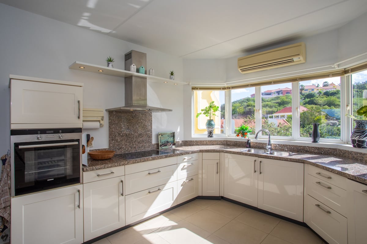 oceanfront 4 bedroom penthouse | private kitchen | full-sized fridge, oven, stovetop, dishwasher