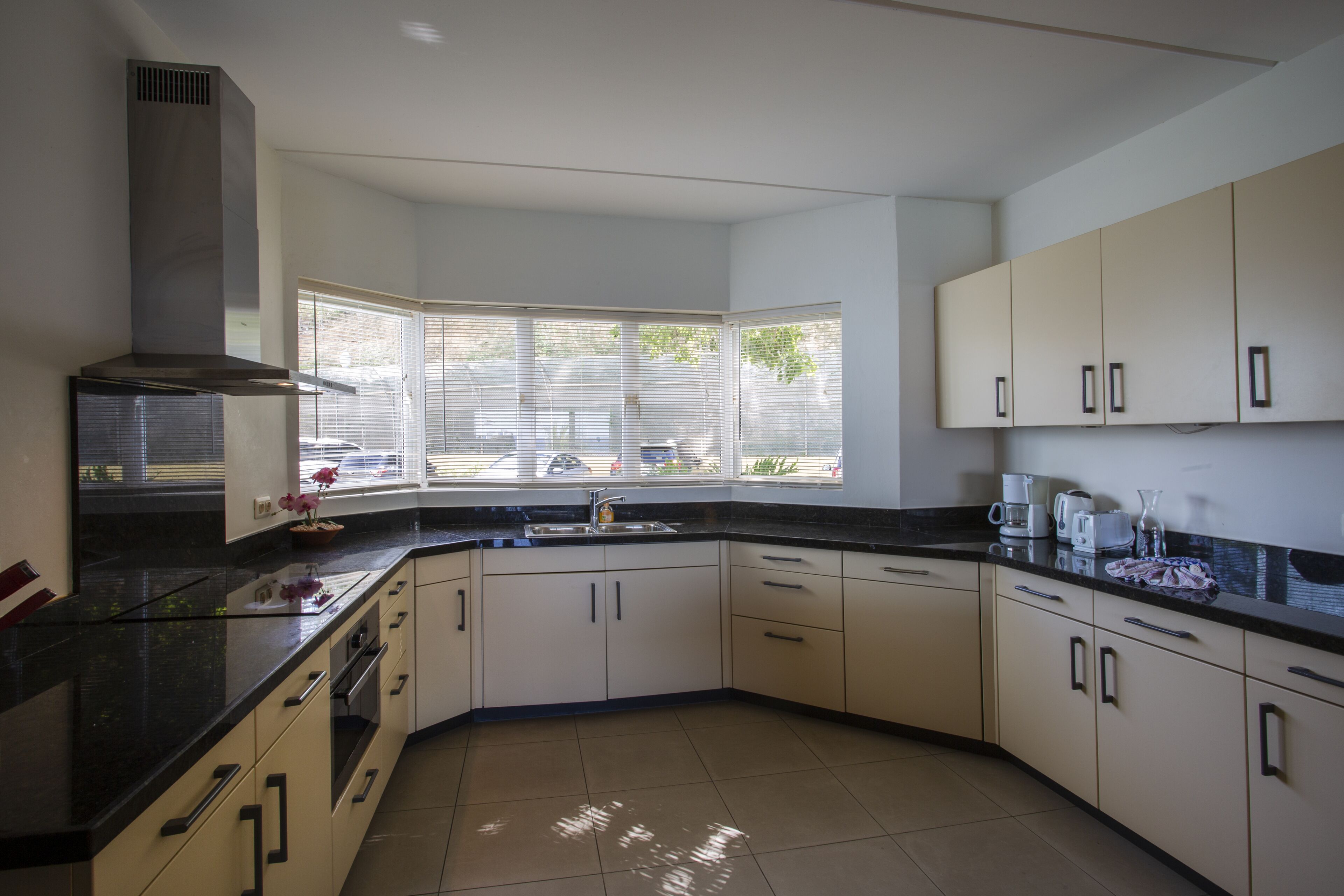 oceanfront 3 bedroom apartment | private kitchen | full-sized fridge, oven, stovetop, dishwasher