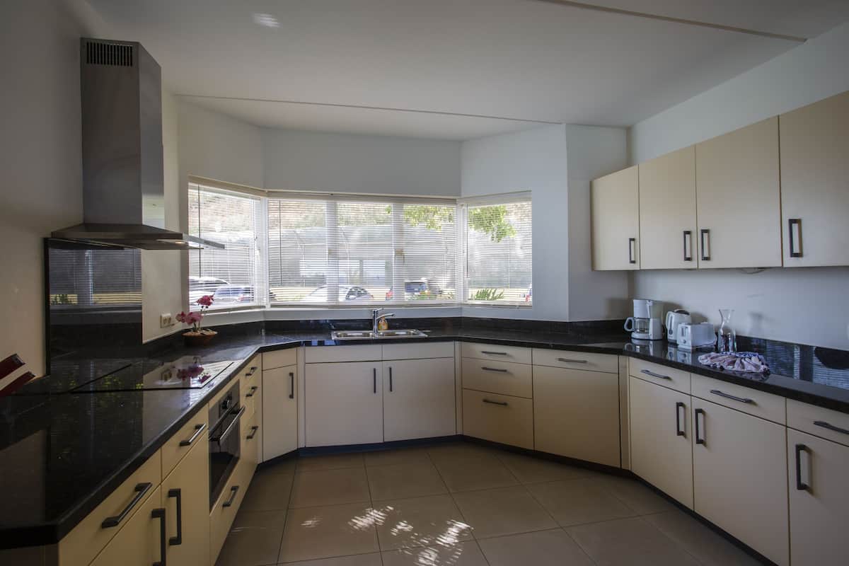 oceanfront 3 bedroom apartment | private kitchen | full-sized fridge, oven, stovetop, dishwasher