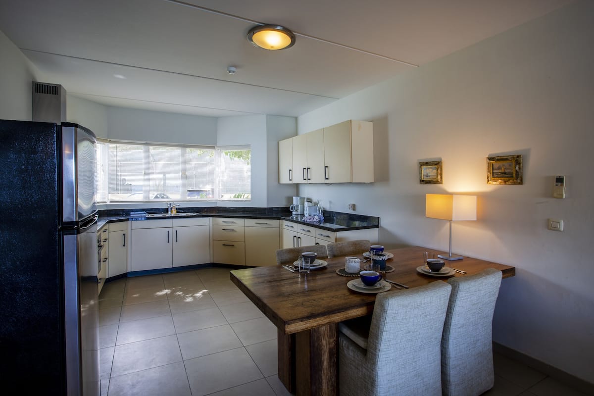 oceanfront 3 bedroom apartment | private kitchen | full-sized fridge, oven, stovetop, dishwasher