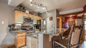 Premier Condo, 2 Bedrooms, Balcony, Mountain View (Tenderfoot Lodge 2673) | Private kitchen | Full-size fridge, microwave, coffee/tea maker, toaster oven