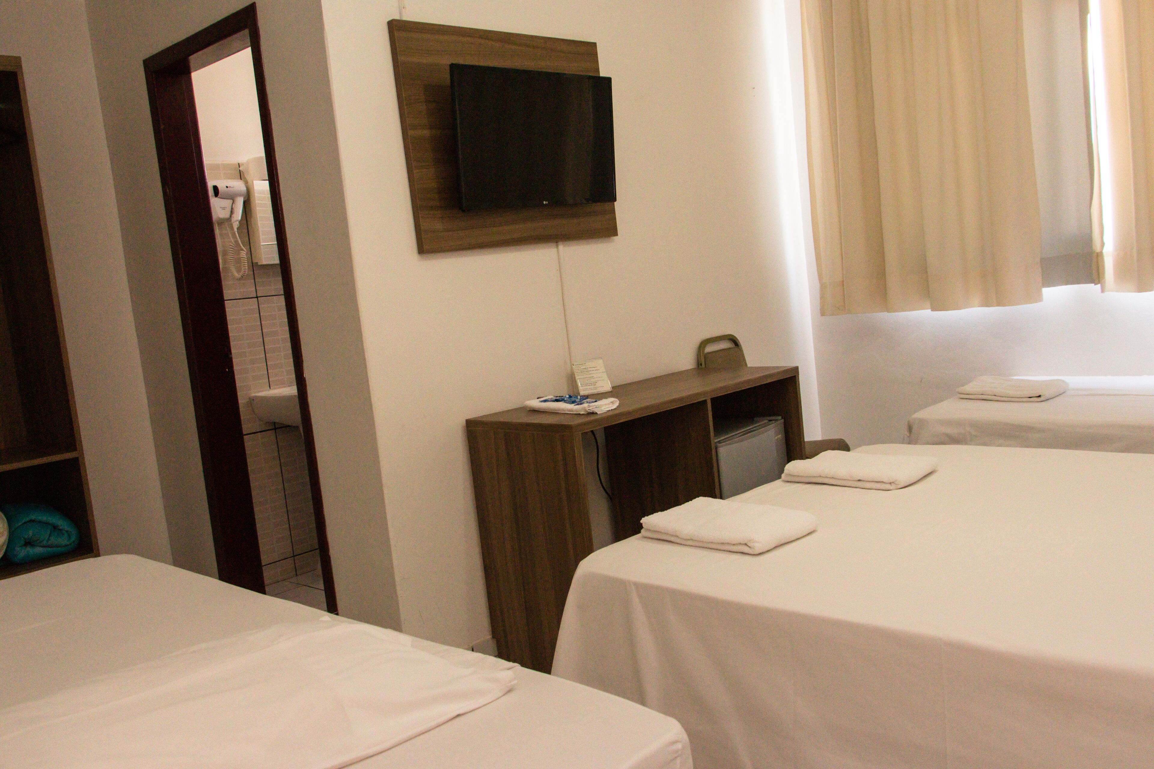 executive quadruple room | minibar, laptop workspace, blackout curtains, free wifi