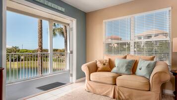 Condo, 2 Bedrooms | Living room | 32-inch flat-screen TV with cable channels, TV