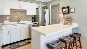 Condo, 3 Bedrooms | Private kitchen - High Pointe E21 by Vacasa (Panama City Beach)