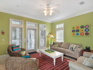 House, 3 Bedrooms | Living room | 32-inch flat-screen TV with cable channels, TV - Lily Pad by Vacasa (Panama City Beach)