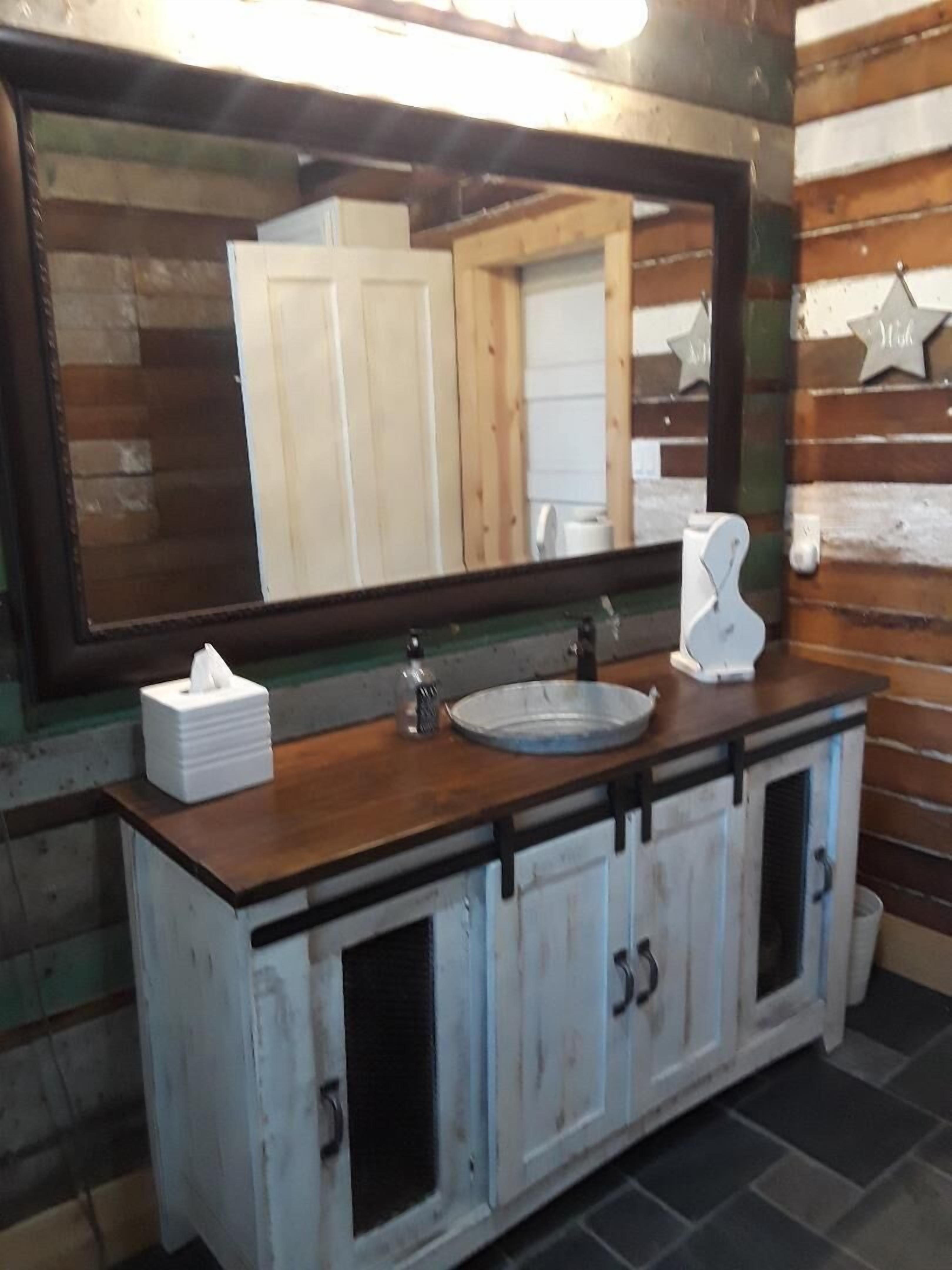 The Rustic Farm House with a Touch of Modern Charm sits on 79 acres.