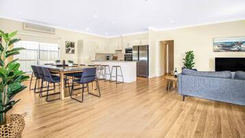 Family House, 4 Bedrooms, Non Smoking | Living area | 22-inch flat-screen TV with digital channels, TV, DVD player