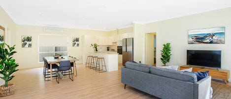 Family House, 4 Bedrooms, Non Smoking | Living area | 22-inch flat-screen TV with digital channels, TV, DVD player