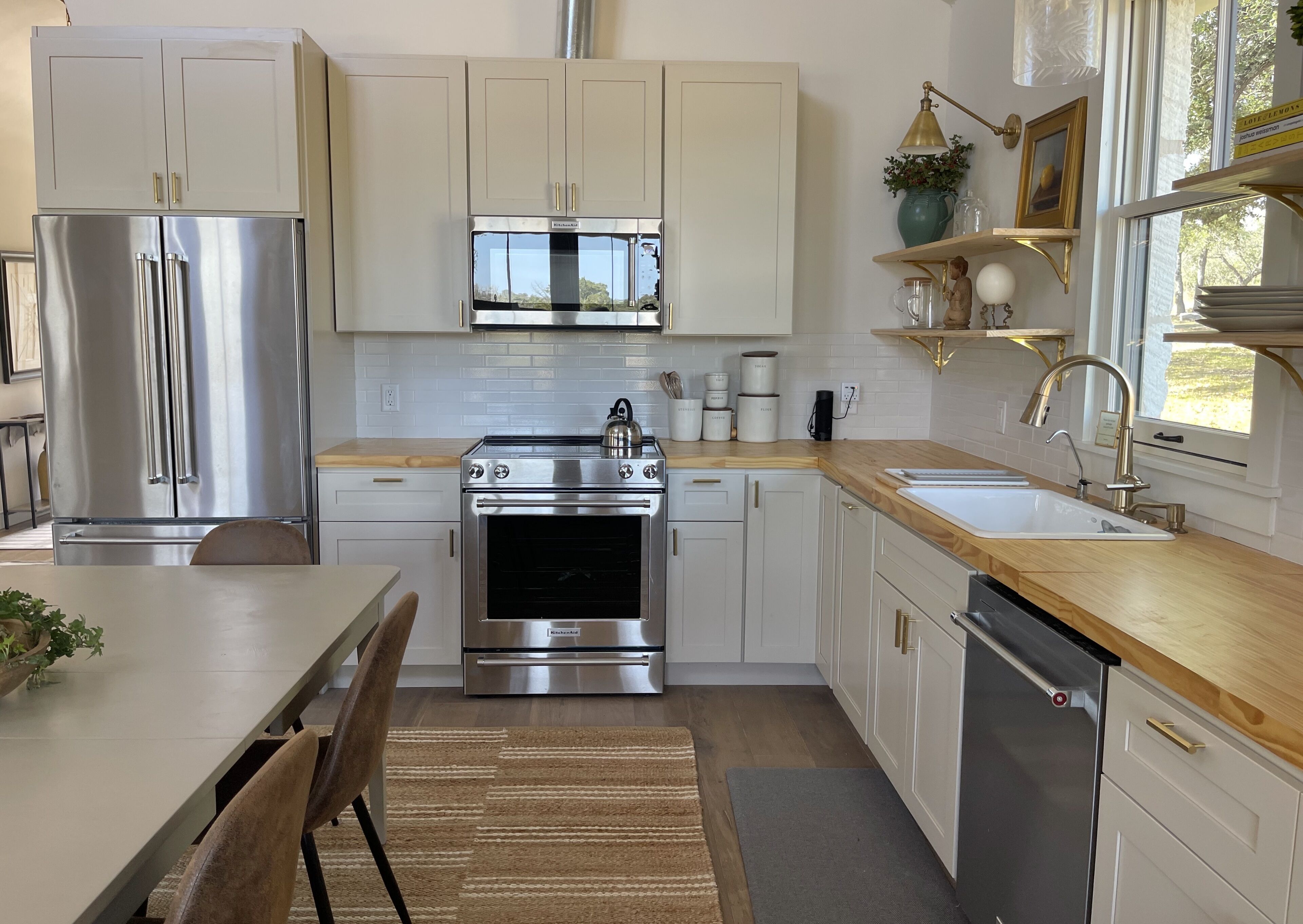  Limestone farmhouse overlooking beautiful hill country creek