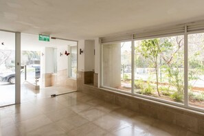 Enjoy a clean and modern space with a large window offering a view of the outdoors.