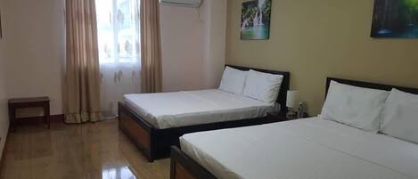 Hypo-allergenic bedding, desk, laptop workspace, free WiFi
