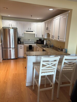 Fridge, microwave, oven, stovetop - Spectacular Beachfront Condo-Watch sunrise from deck overlooking beach. (Old Orchard Beach)