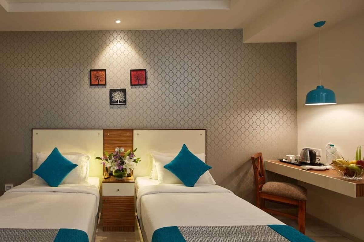 Executive Room (Twin Bed) | Minibar, Zimmersafe, individuell eingerichtet, Schreibtisch