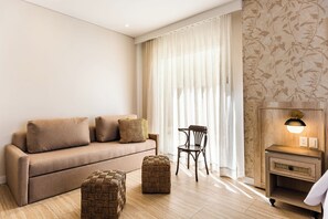 Suite júnior, 1 llit de matrimoni gran i sofà llit | Roba de llit hipoal·lergògena, minibar i caixa forta a l'habitació 