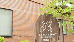 A brick building with a sign that reads "The Grand Resort Elegant." - The Gran Resort Elegante Karuizawa (Karuizawa)